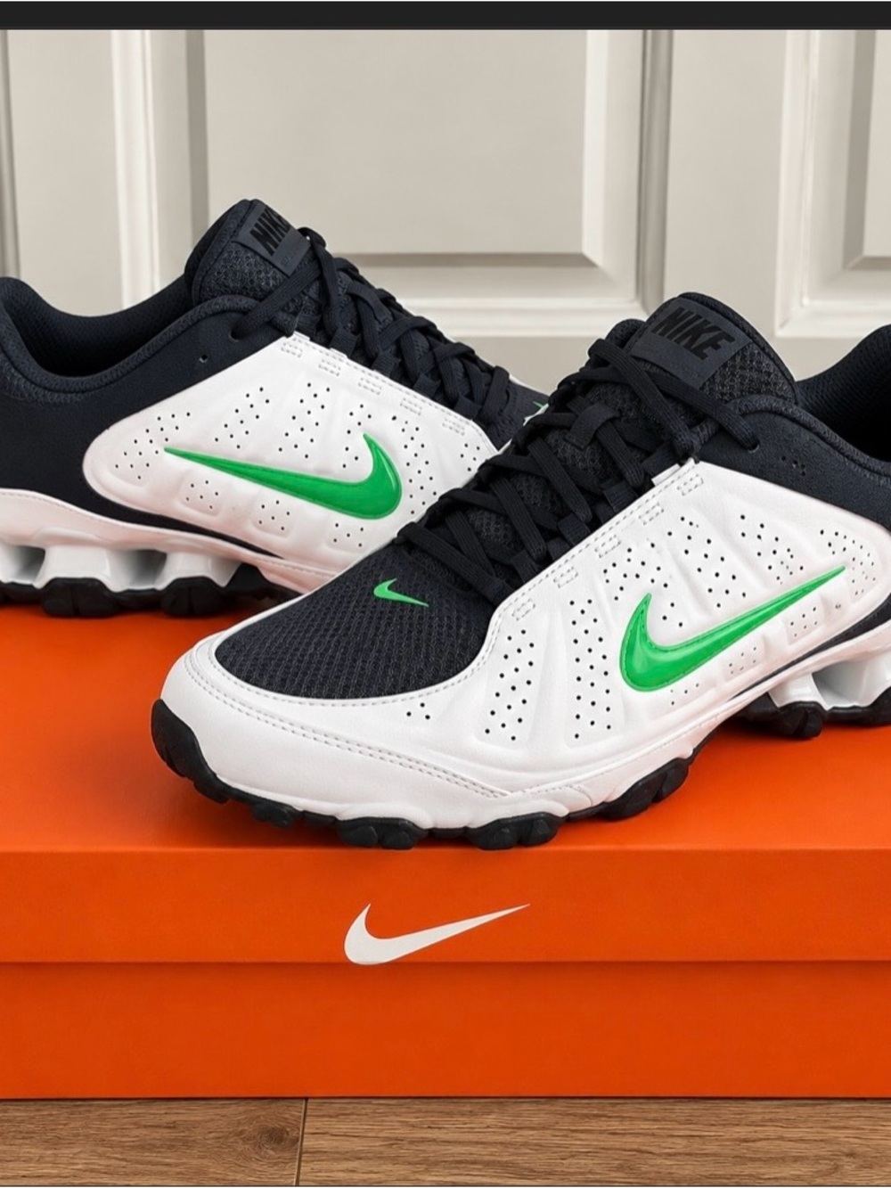 Nike Men’s Black and White Sneakers with Green Swoosh Accent